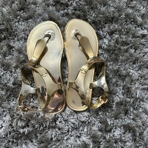 Michael Michael Kors gold metallic thong sandal. Size 8. Great condition.